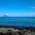 Sulawesi Utara , Pantai Malalayang, Manado – Sulawesi Utara : perpaduan batuan hitam dan pantai malalayang