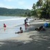 Papua, : wisatawan di pantai holtekamp
