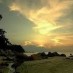 Papua, : Suasana senja di pantai teluk makmur