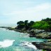Lampung, : pantai yang curam di pantai karapyak